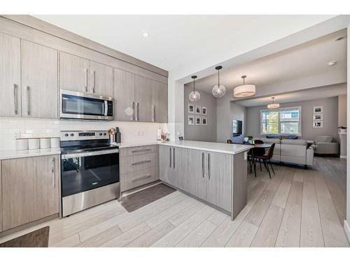 126 Dawson Harbour Grove, Chestermere, AB - Indoor Photo Showing Kitchen