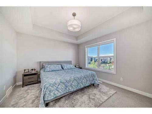 126 Dawson Harbour Grove, Chestermere, AB - Indoor Photo Showing Bedroom