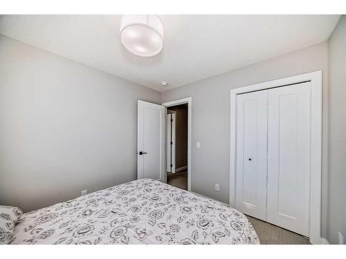 126 Dawson Harbour Grove, Chestermere, AB - Indoor Photo Showing Bedroom