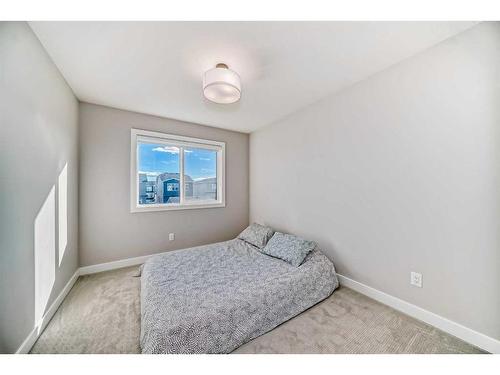 126 Dawson Harbour Grove, Chestermere, AB - Indoor Photo Showing Bedroom