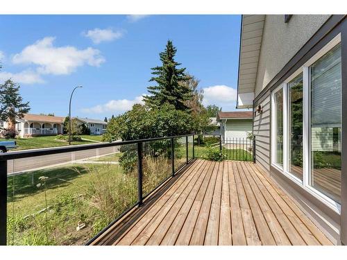 76 Huntmeadow Road Ne, Calgary, AB - Outdoor With Deck Patio Veranda