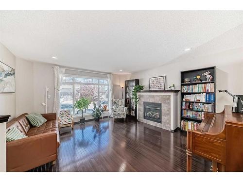 239 Sage Bank Grove Nw, Calgary, AB - Indoor Photo Showing Living Room With Fireplace