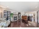 239 Sage Bank Grove Nw, Calgary, AB  - Indoor Photo Showing Living Room With Fireplace 