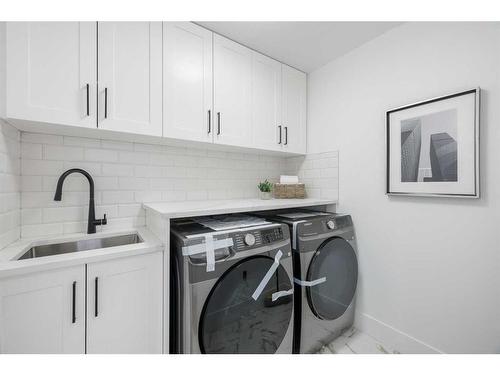 5035 Bulyea Road Nw, Calgary, AB - Indoor Photo Showing Laundry Room