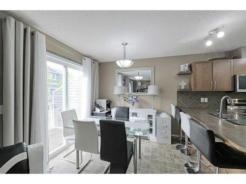 1204-800 Yankee Valley Boulevard Se, Airdrie, AB - Indoor Photo Showing Kitchen With Double Sink