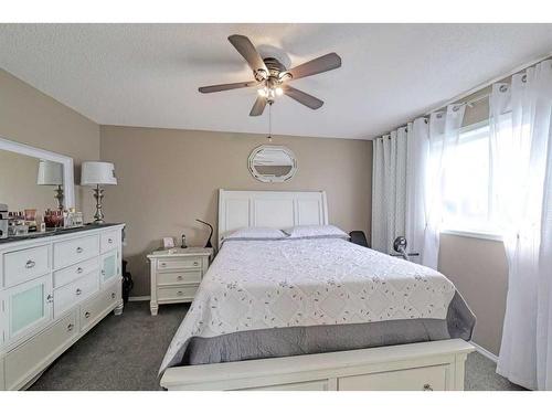 1204-800 Yankee Valley Boulevard Se, Airdrie, AB - Indoor Photo Showing Bedroom