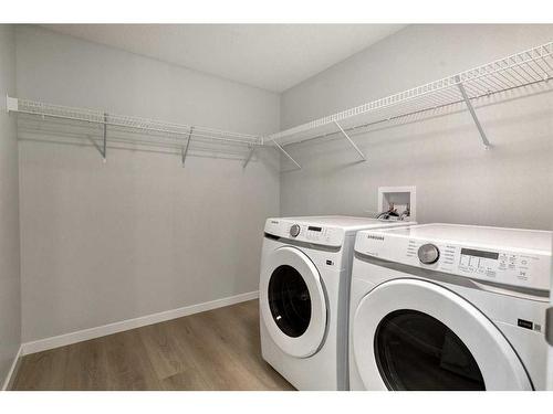 4201-550 Belmont Street Sw, Calgary, AB - Indoor Photo Showing Laundry Room