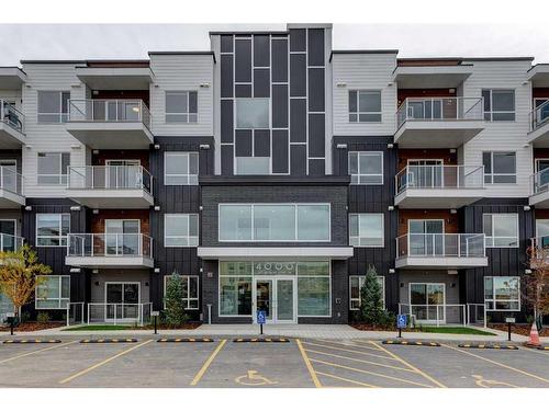 4201-550 Belmont Street Sw, Calgary, AB - Outdoor With Balcony With Facade