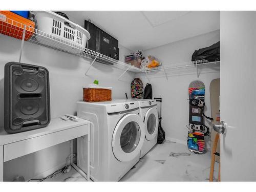 3409-220 Seton Grove Se, Calgary, AB - Indoor Photo Showing Laundry Room