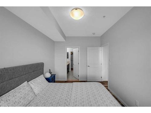 307-4150 Seton Drive Se, Calgary, AB - Indoor Photo Showing Bedroom