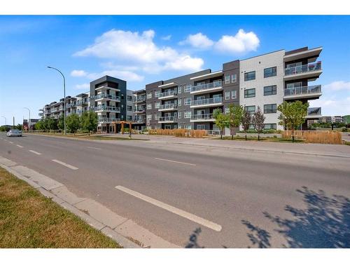 307-4150 Seton Drive Se, Calgary, AB - Outdoor With Balcony With Facade