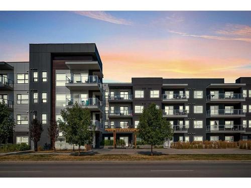 307-4150 Seton Drive Se, Calgary, AB - Outdoor With Balcony With Facade