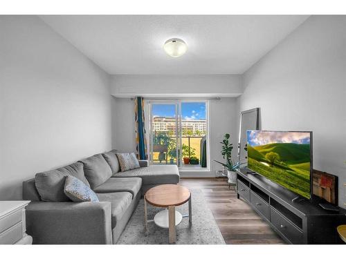 307-4150 Seton Drive Se, Calgary, AB - Indoor Photo Showing Living Room