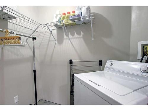 12 Panorama Hills Cove Nw, Calgary, AB - Indoor Photo Showing Laundry Room