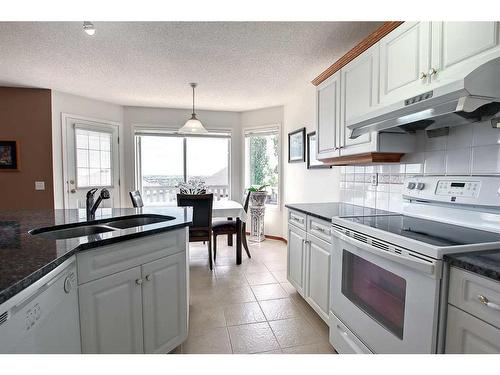 12 Panorama Hills Cove Nw, Calgary, AB - Indoor Photo Showing Kitchen With Double Sink