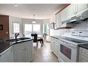 12 Panorama Hills Cove Nw, Calgary, AB  - Indoor Photo Showing Kitchen With Double Sink 