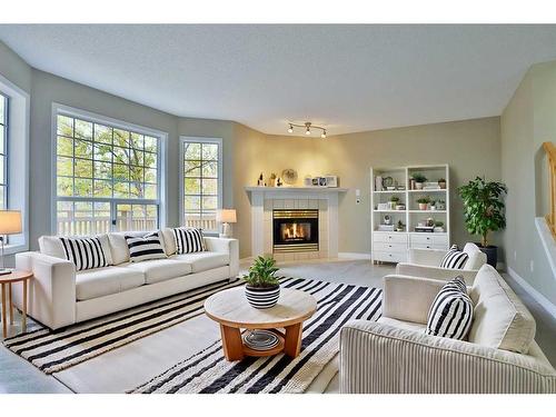 212 Scenic Acres Terrace Nw, Calgary, AB - Indoor Photo Showing Living Room With Fireplace