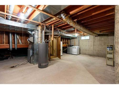 51 Woodfern Rise Sw, Calgary, AB - Indoor Photo Showing Basement