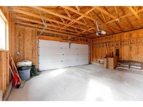 51 Woodfern Rise Sw, Calgary, AB - Indoor Photo Showing Garage