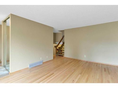 51 Woodfern Rise Sw, Calgary, AB - Indoor Photo Showing Other Room