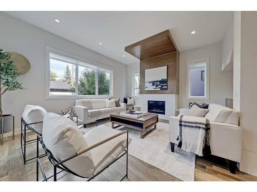 1722 47 Avenue Sw, Calgary, AB - Indoor Photo Showing Living Room With Fireplace