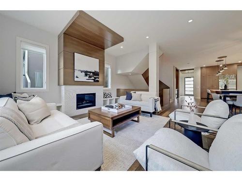 1722 47 Avenue Sw, Calgary, AB - Indoor Photo Showing Living Room With Fireplace