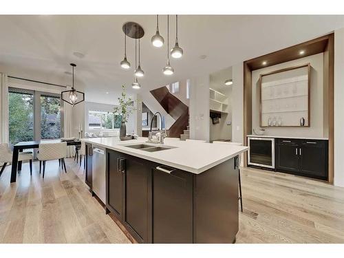 1722 47 Avenue Sw, Calgary, AB - Indoor Photo Showing Kitchen With Double Sink With Upgraded Kitchen