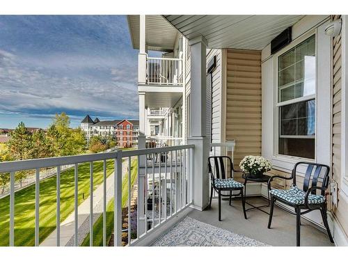 308-1 Crystal Green Lane, Okotoks, AB - Outdoor With Balcony With Exterior