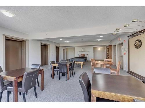 308-1 Crystal Green Lane, Okotoks, AB - Indoor Photo Showing Dining Room