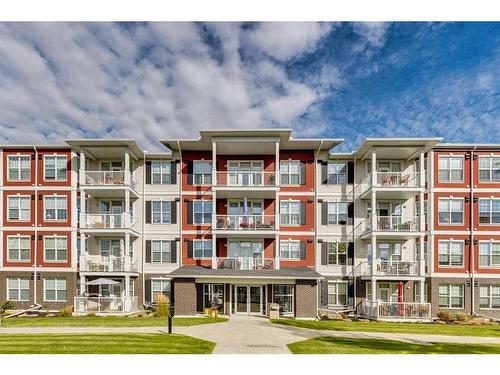 308-1 Crystal Green Lane, Okotoks, AB - Outdoor With Balcony With Facade