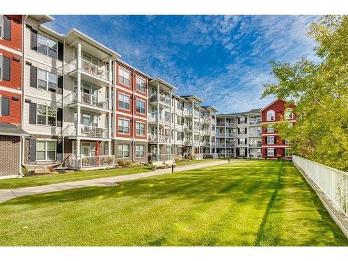 308-1 Crystal Green Lane, Okotoks, AB - Outdoor With Balcony With Facade