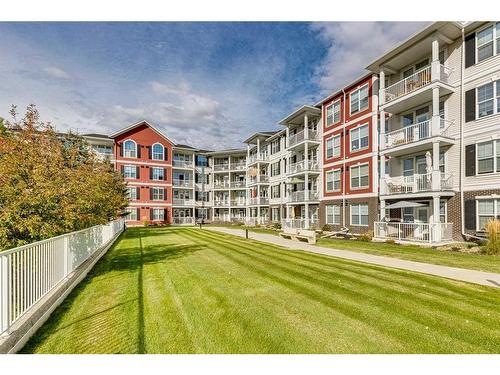 308-1 Crystal Green Lane, Okotoks, AB - Outdoor With Balcony With Facade