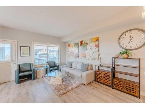 1007-250 Sage Valley Road Nw, Calgary, AB - Indoor Photo Showing Living Room