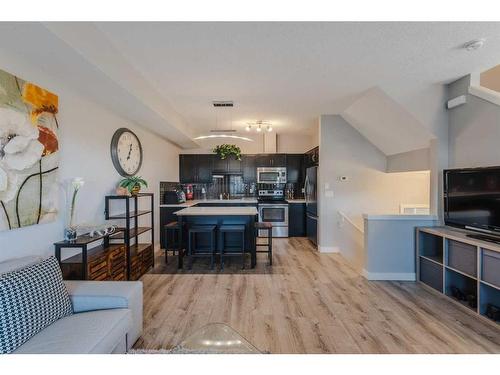 1007-250 Sage Valley Road Nw, Calgary, AB - Indoor Photo Showing Living Room