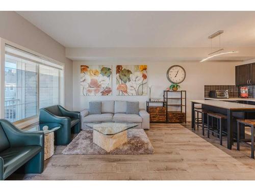 1007-250 Sage Valley Road Nw, Calgary, AB - Indoor Photo Showing Living Room