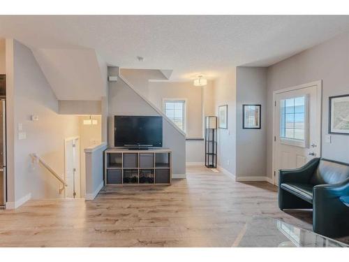 1007-250 Sage Valley Road Nw, Calgary, AB - Indoor Photo Showing Living Room