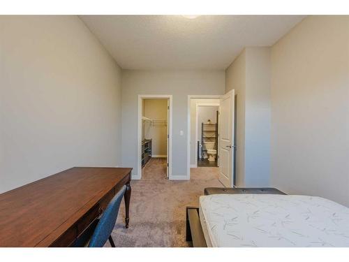 1007-250 Sage Valley Road Nw, Calgary, AB - Indoor Photo Showing Bedroom