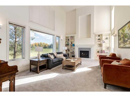 31 Country Lane Terrace, Rural Rocky View County, AB - Indoor Photo Showing Living Room With Fireplace