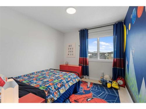 60 Wolf Creek Street Se, Calgary, AB - Indoor Photo Showing Bedroom