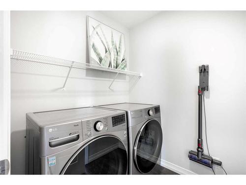 60 Wolf Creek Street Se, Calgary, AB - Indoor Photo Showing Laundry Room