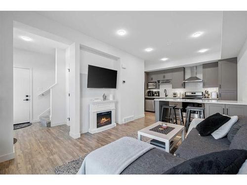 2104-100 Walgrove Court Se, Calgary, AB - Indoor Photo Showing Living Room With Fireplace