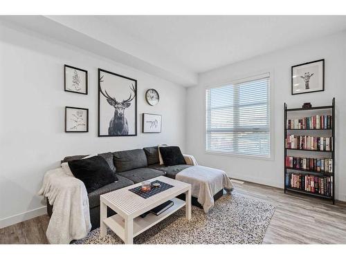 2104-100 Walgrove Court Se, Calgary, AB - Indoor Photo Showing Living Room