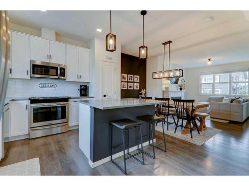 340 Kingsmere Way Se, Airdrie, AB - Indoor Photo Showing Kitchen With Stainless Steel Kitchen With Upgraded Kitchen