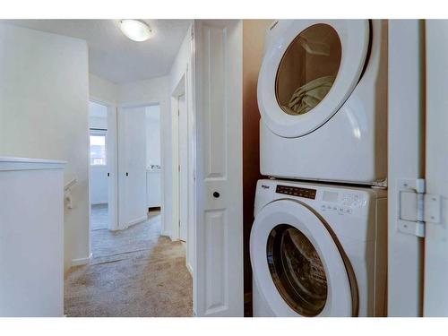 340 Kingsmere Way Se, Airdrie, AB - Indoor Photo Showing Laundry Room