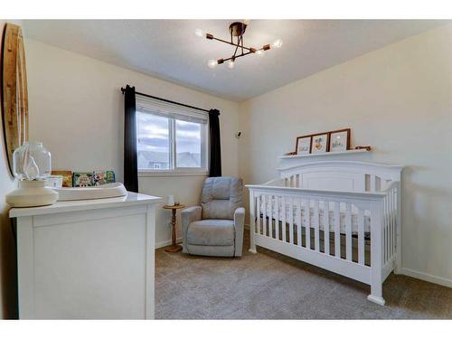 340 Kingsmere Way Se, Airdrie, AB - Indoor Photo Showing Bedroom