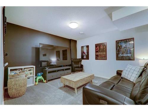 340 Kingsmere Way Se, Airdrie, AB - Indoor Photo Showing Living Room