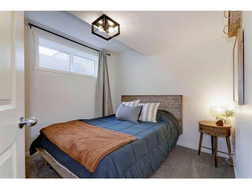 340 Kingsmere Way Se, Airdrie, AB - Indoor Photo Showing Bedroom