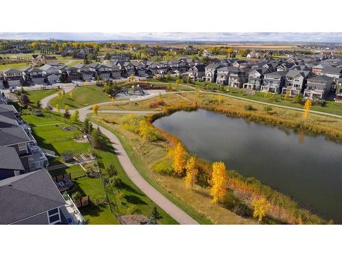 340 Kingsmere Way Se, Airdrie, AB - Outdoor With Body Of Water With View