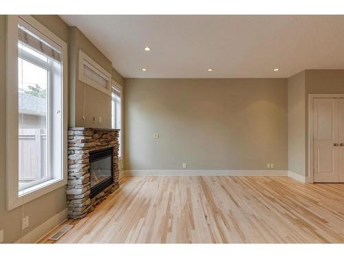 2-2231 28 Street Sw, Calgary, AB - Indoor With Fireplace