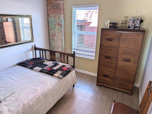 A & B-2109 20 Street, Nanton, AB - Indoor Photo Showing Bedroom